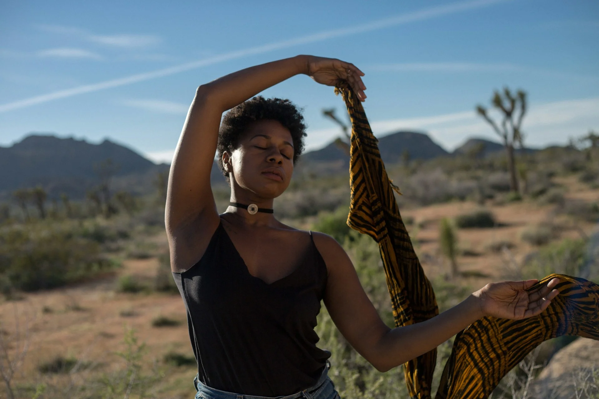 black woman at peace in nature